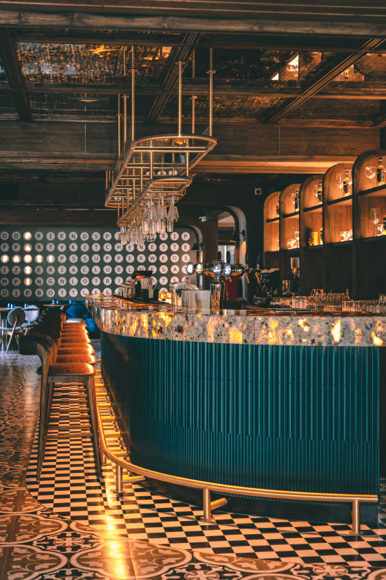 FARZI Cafe — teal bar